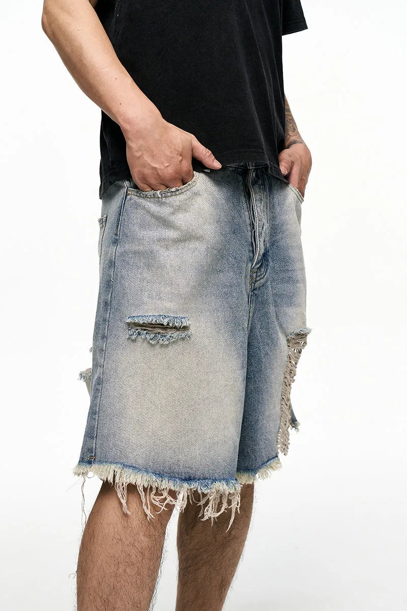 Light blue men's retro washed denim shorts with baggy wide leg fit
