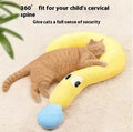 Blue moon-shaped and yellow question mark-shaped cloth pillows for cats, showing U-shaped neck support design.
