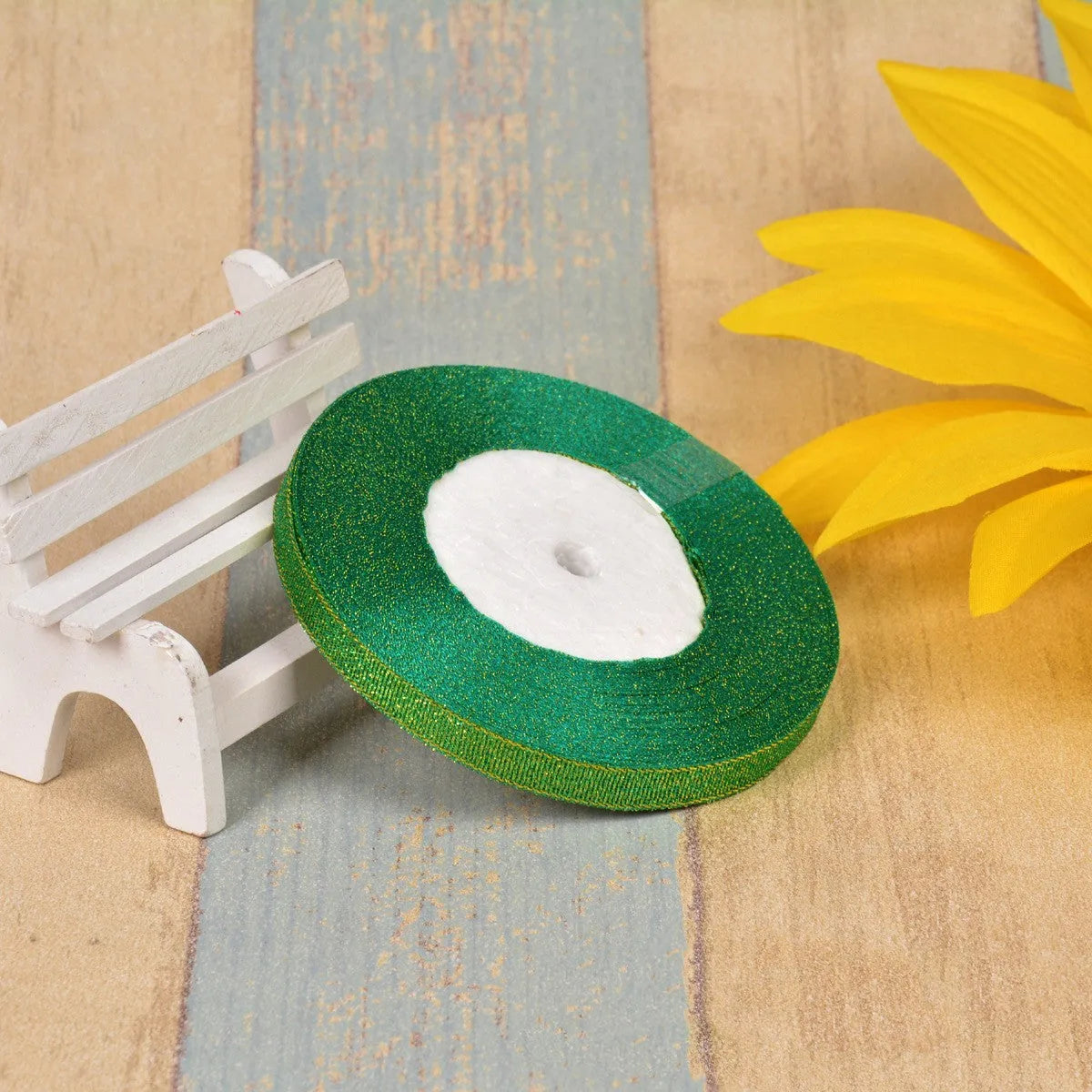 Colourful green onion pattern polyester ribbon with gold wire detailing, 1cm wide.