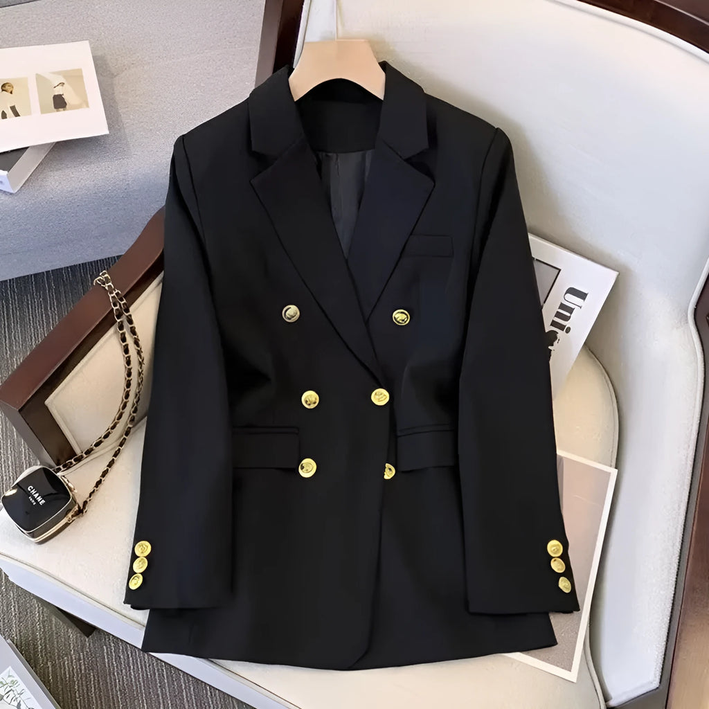 Women's loose fit polyester blouse in black showing slimming silhouette and regular sleeves