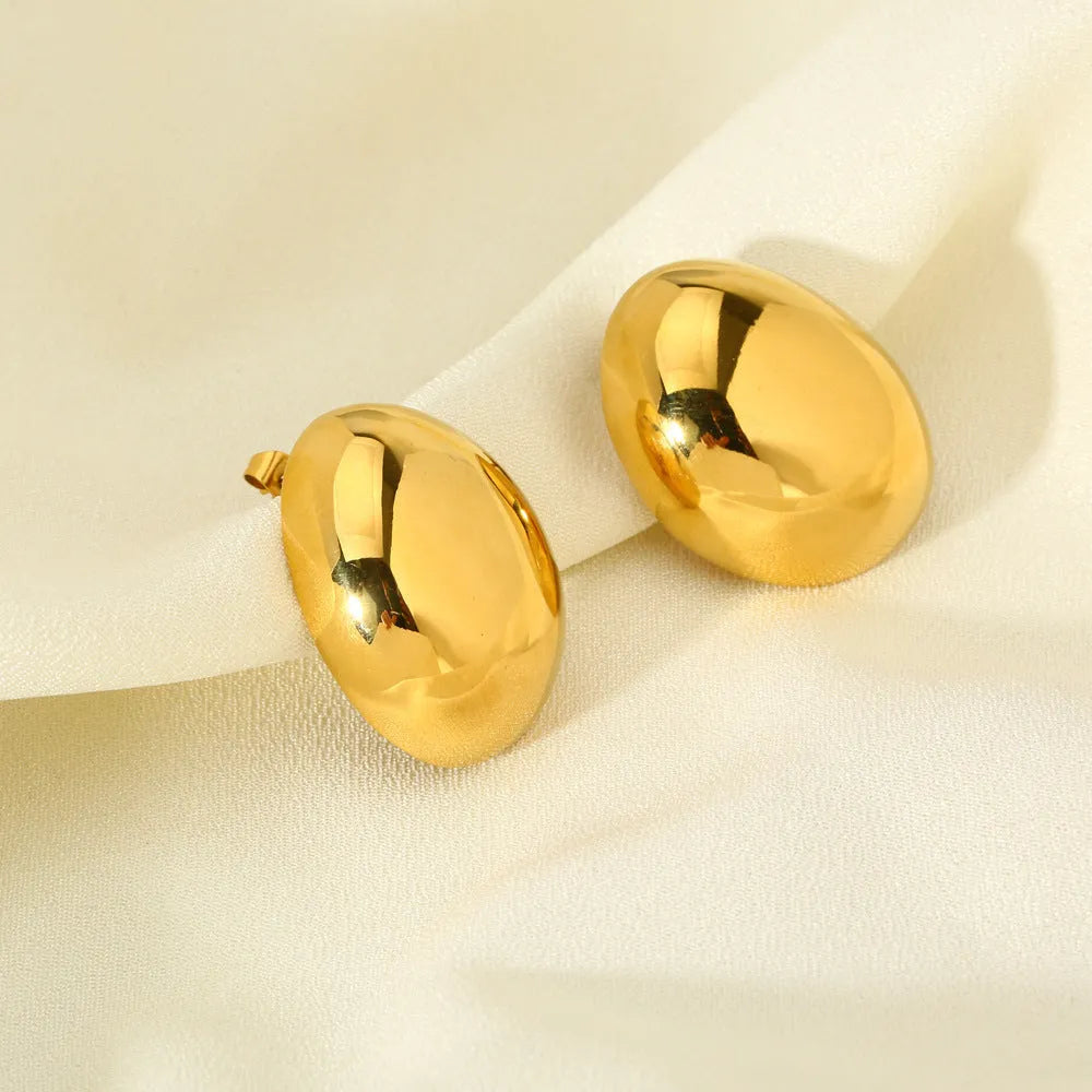 Geometric stainless steel ear studs with glazed 18K gold electroplated surface in DFE139 colour
