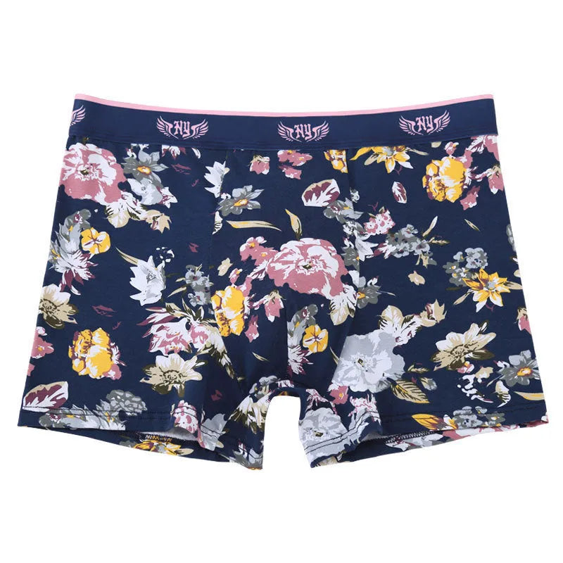 Men's cotton boxer briefs on a white background, showing the U-shaped pouch design and a floral pattern.