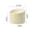 Elevated ceramic cat bowl in green colour with tilted design for whisker-friendly feeding