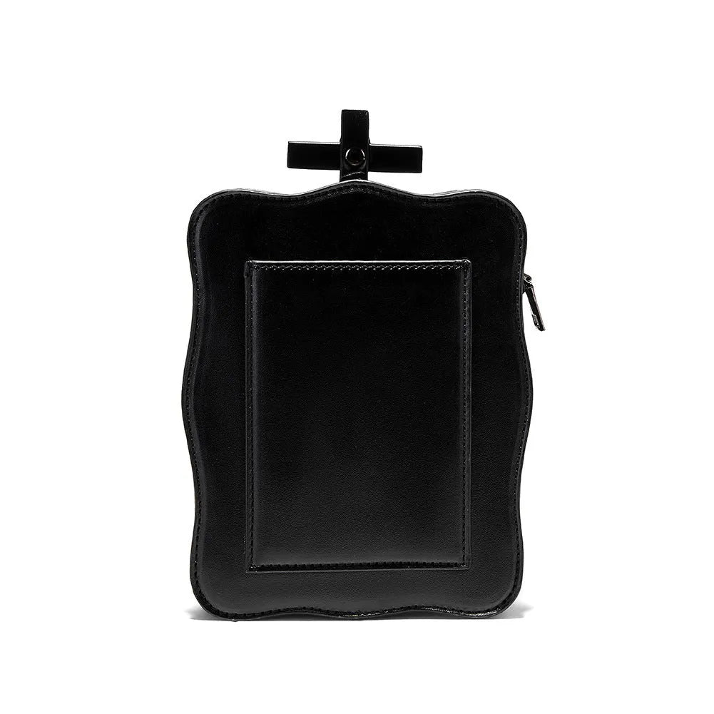Black mini square crossbody bag with 3D embossed skull design and chain strap