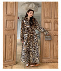 Women's faux fur coat with real fur collar in street fashion style