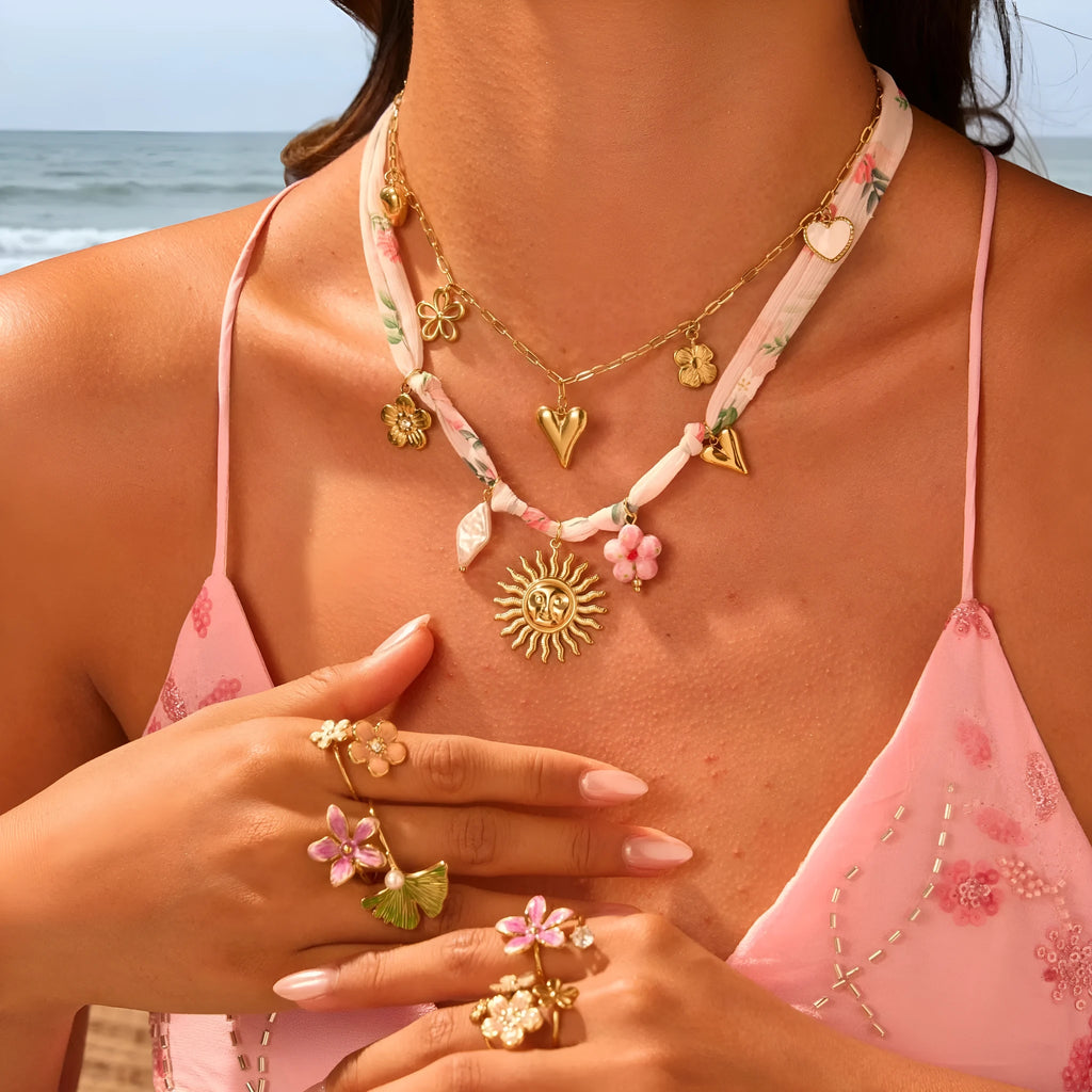 Stainless steel necklace with geometric sun pendant on adjustable 41-50cm chain, 18K electroplated finish