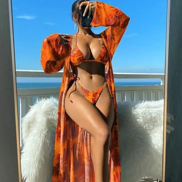 Women's sleeved bikini swimsuit set with matching robe in floral and solid colour options