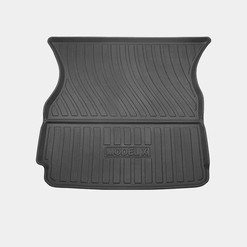 Tesla Model X black TPE rubber floor mats and boot liner set on car interior.