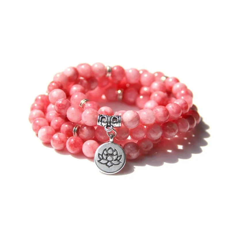 Women's vintage-style bracelet with a natural stone angel echeveria lotus pendant on a chain.