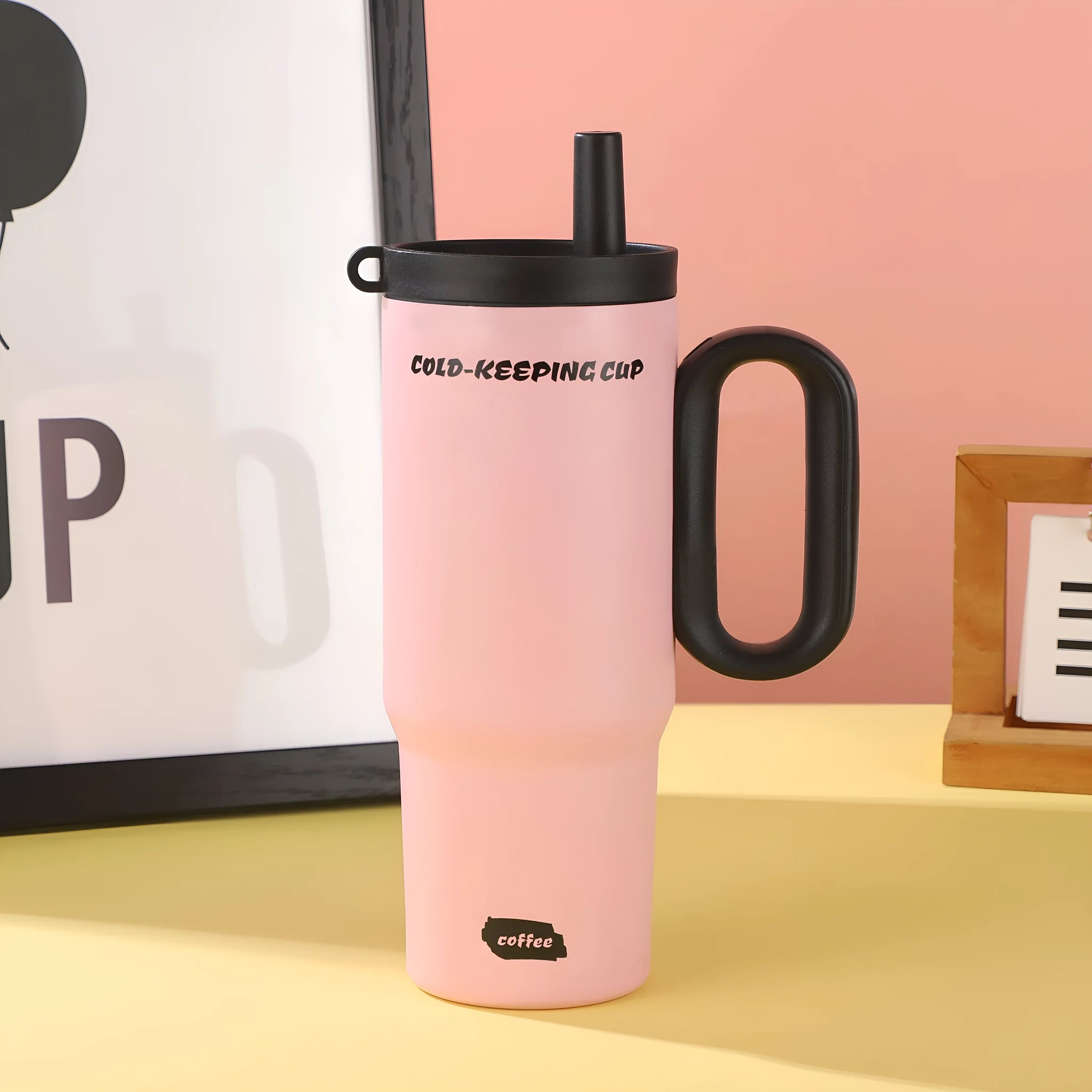 Large stainless steel insulated straw cup with handle in multiple colour options.