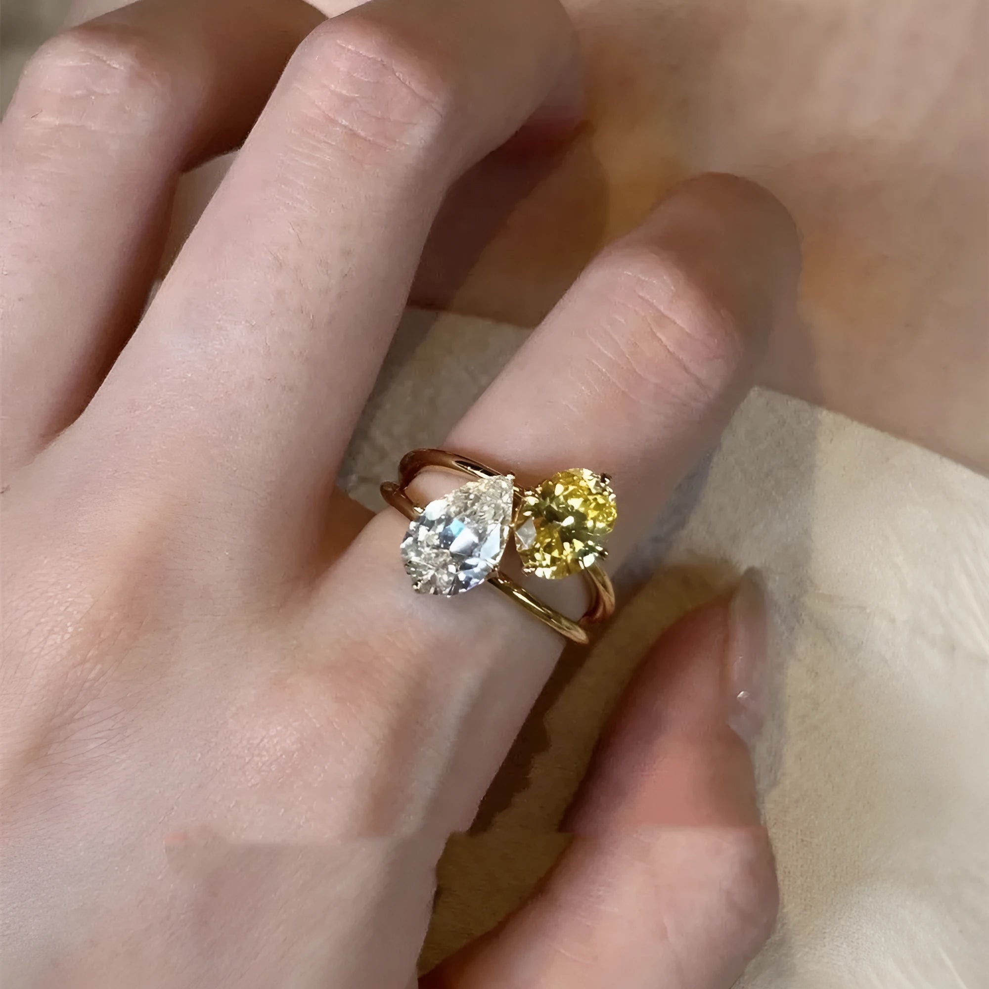 Women's geometric open ring with water drop design and double colour zircon stones on copper base