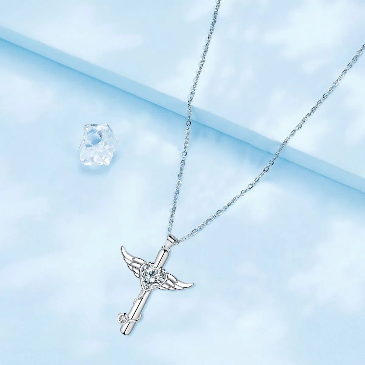 Sterling silver electroplated cross stethoscope necklace with wing design pendant and diamond crystals