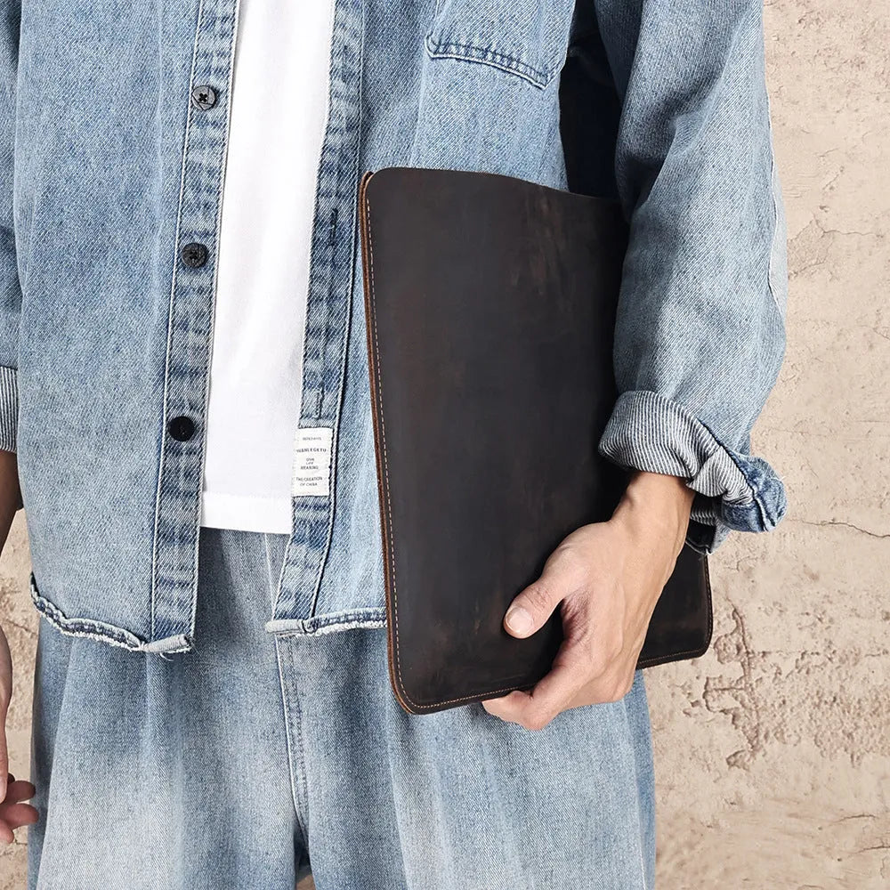 Brown genuine cowhide horizontal computer liner bag showing laptop compartment