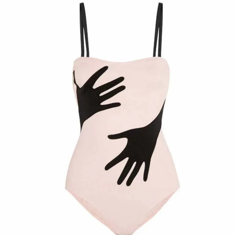 Women's one-piece bikini swimsuit with a gauze skirt cover-up.
