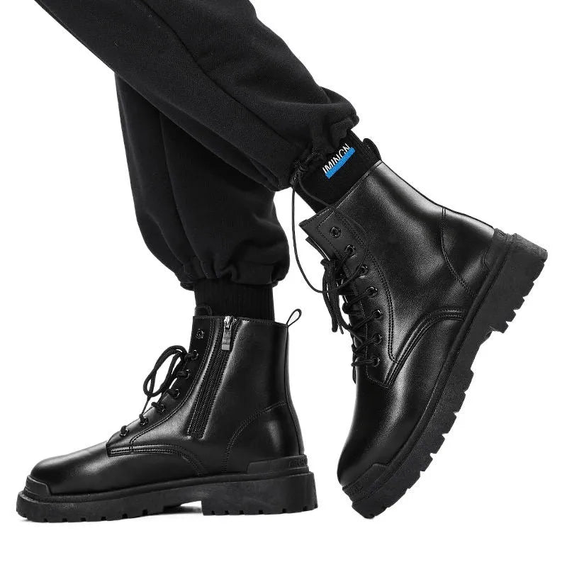 Men's black British style mid-top leather ankle boots with rubber sole.