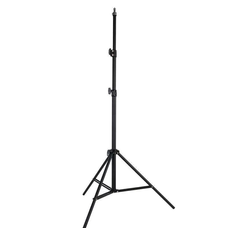 Frosted finish tripod light stand with mobile phone holder mounted, showing carbon steel construction and adjustable legs