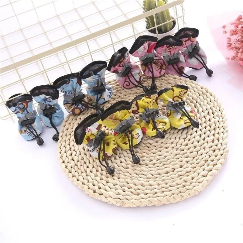 Soft sole cloth dog shoes available in multiple colours and sizes with fleece-lined and monkey print options