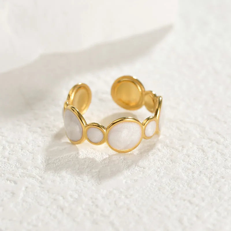 Adjustable geometric stainless steel ring with electroplated surface design