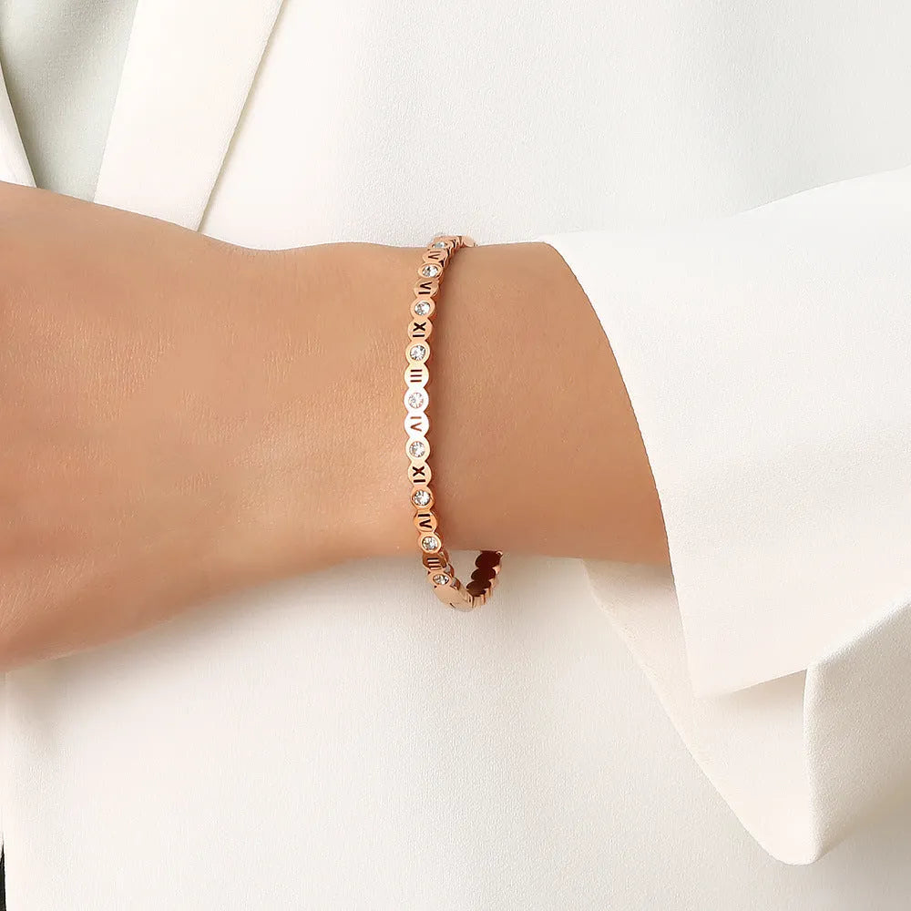 Korean style titanium steel bracelet with number design in gold, rose gold, or steel colour.