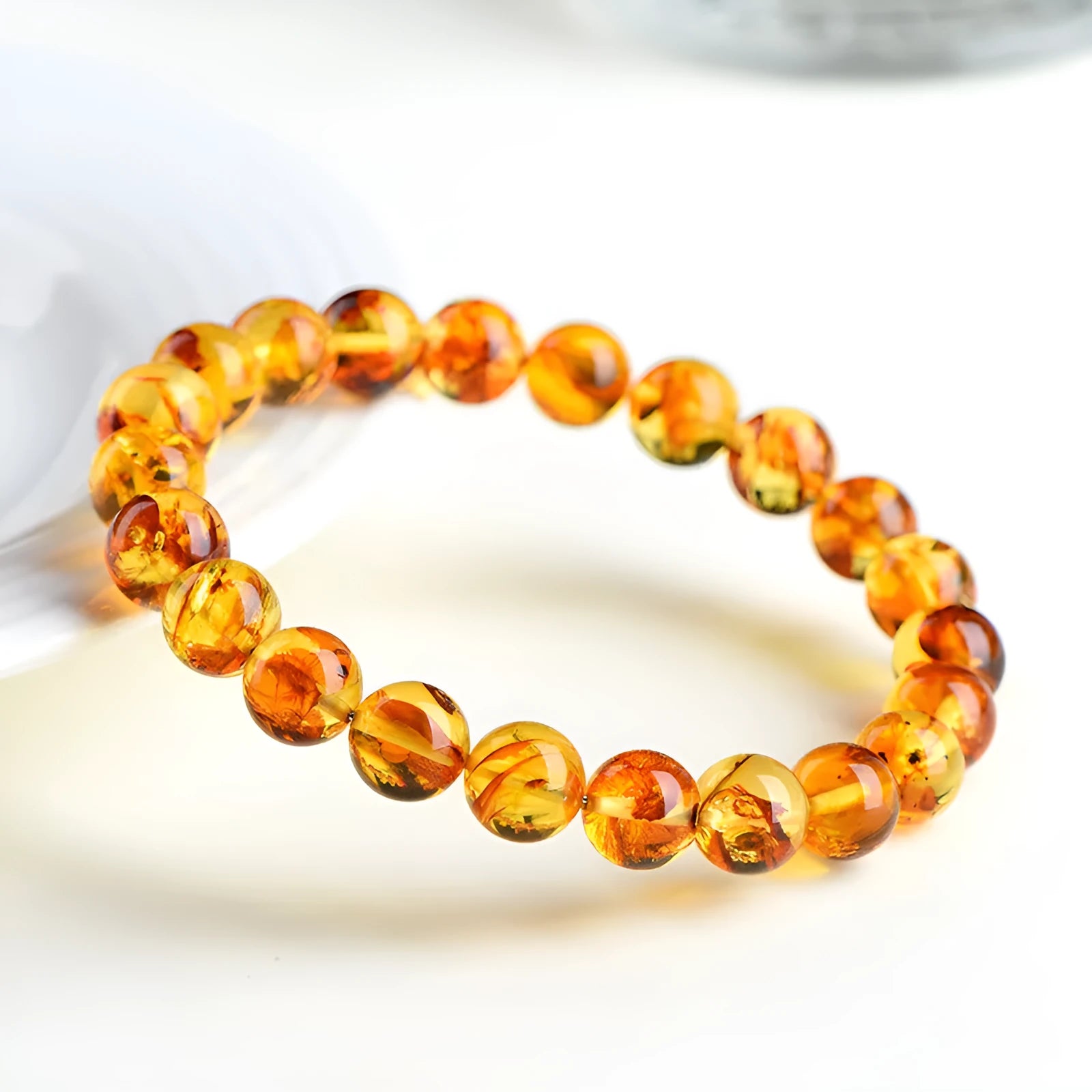Natural yellow piebald amber geometric bracelet with polished beads