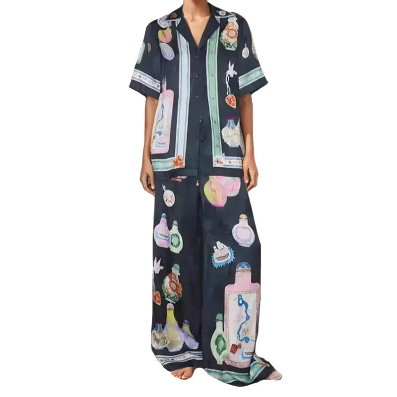 Black women's casual set with cartoon print cardigan top and matching trousers