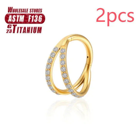 Titanium alloy fork nose ring in silver colour on a plain background, showing its shape and size.
