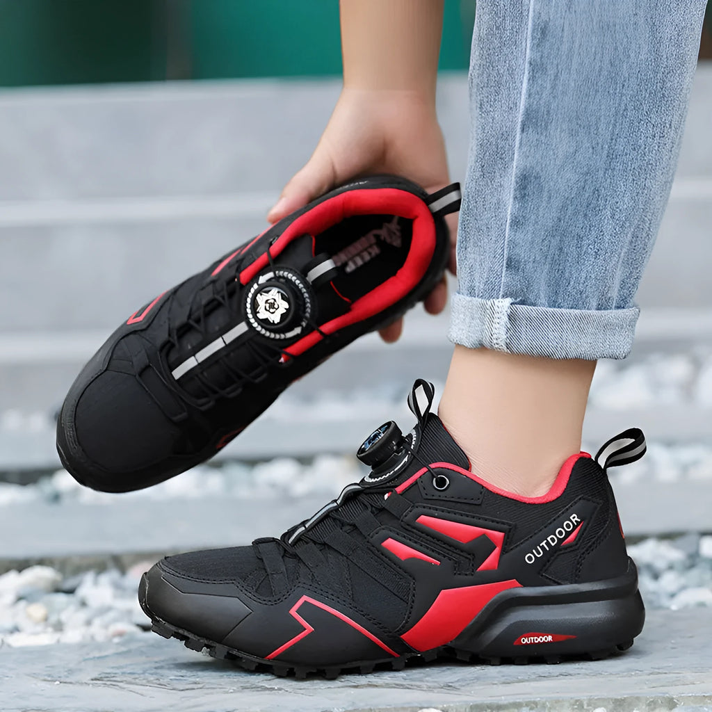 Men's beige and black lightweight hiking shoes with an elastic band closure and textured rubber sole.