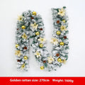 Snow-flocked Christmas rattan garland vine in red, draped on a mantelpiece.