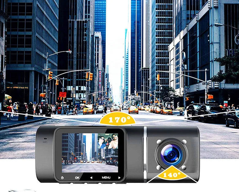 Black dash cam with 1.5-inch screen mounted on car windscreen showing dual camera recording.