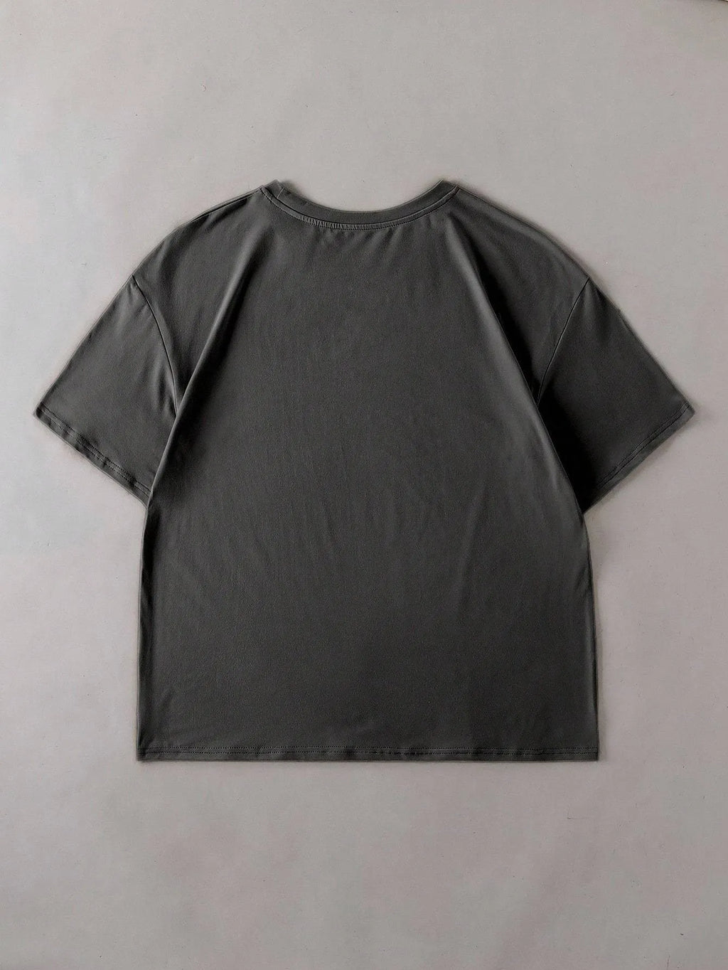 A straight-cut cotton T-shirt with short sleeves and a round neck, shown in one of the available colours.