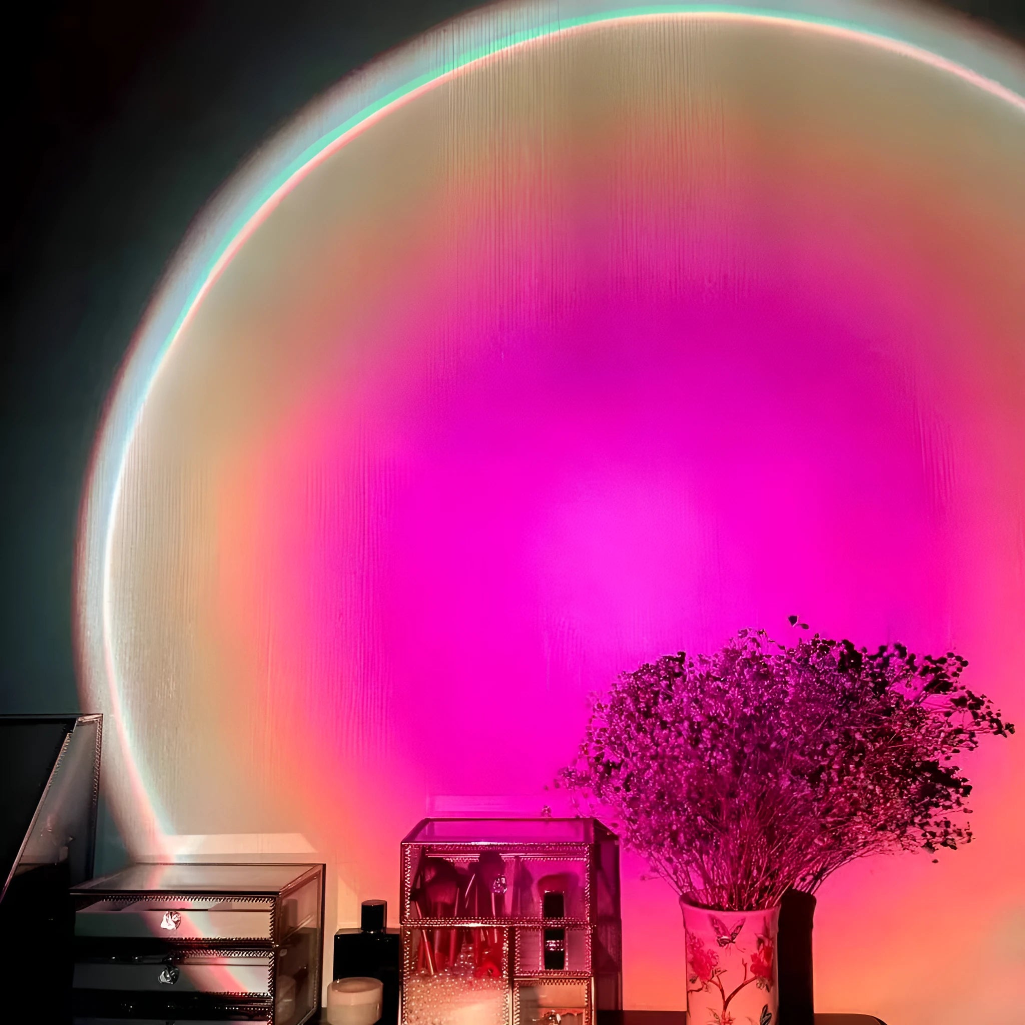 Rechargeable sunset projection lamp showing rainbow atmospheric lighting with USB power connector