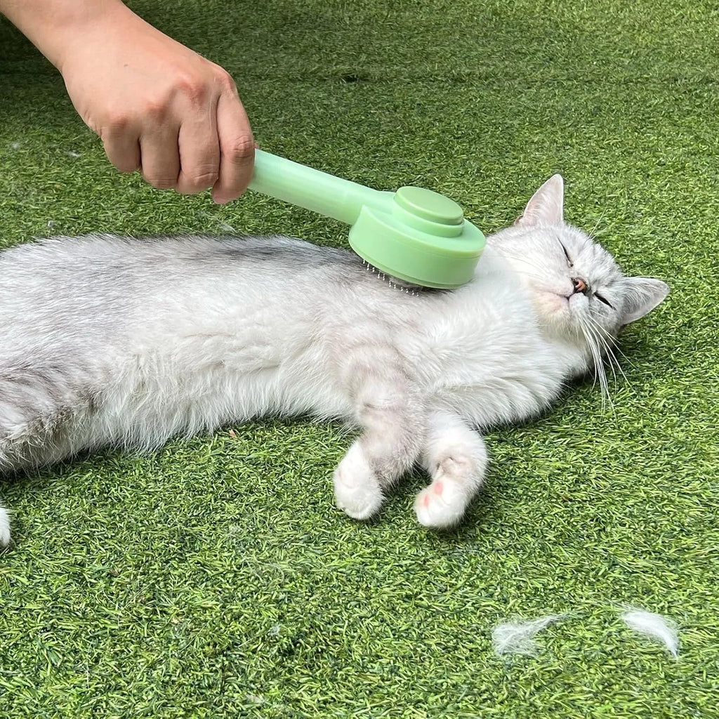 Green 2-in-1 pet grooming brush with stainless steel teeth for cats and dogs measuring 17.5cm