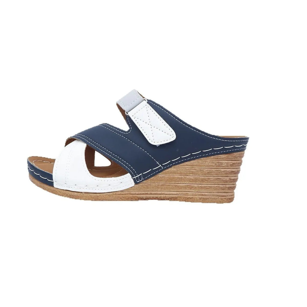 Women's wedge platform slippers with Velcro straps in two-tone colour options showing fish mouth toe shape