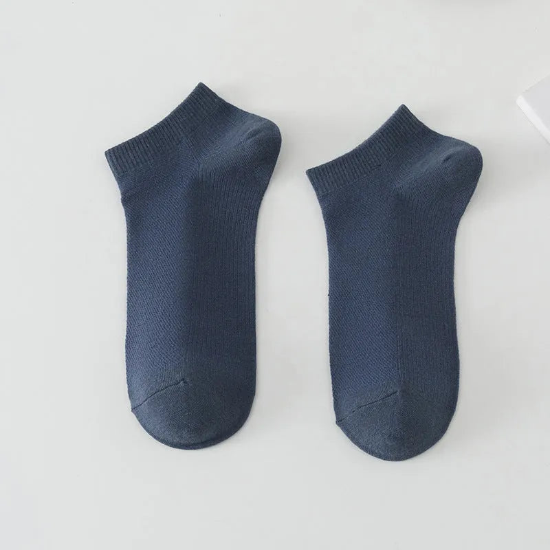 Solid colour low-cut polyester boat socks for men, shown in one of six available colour variants.