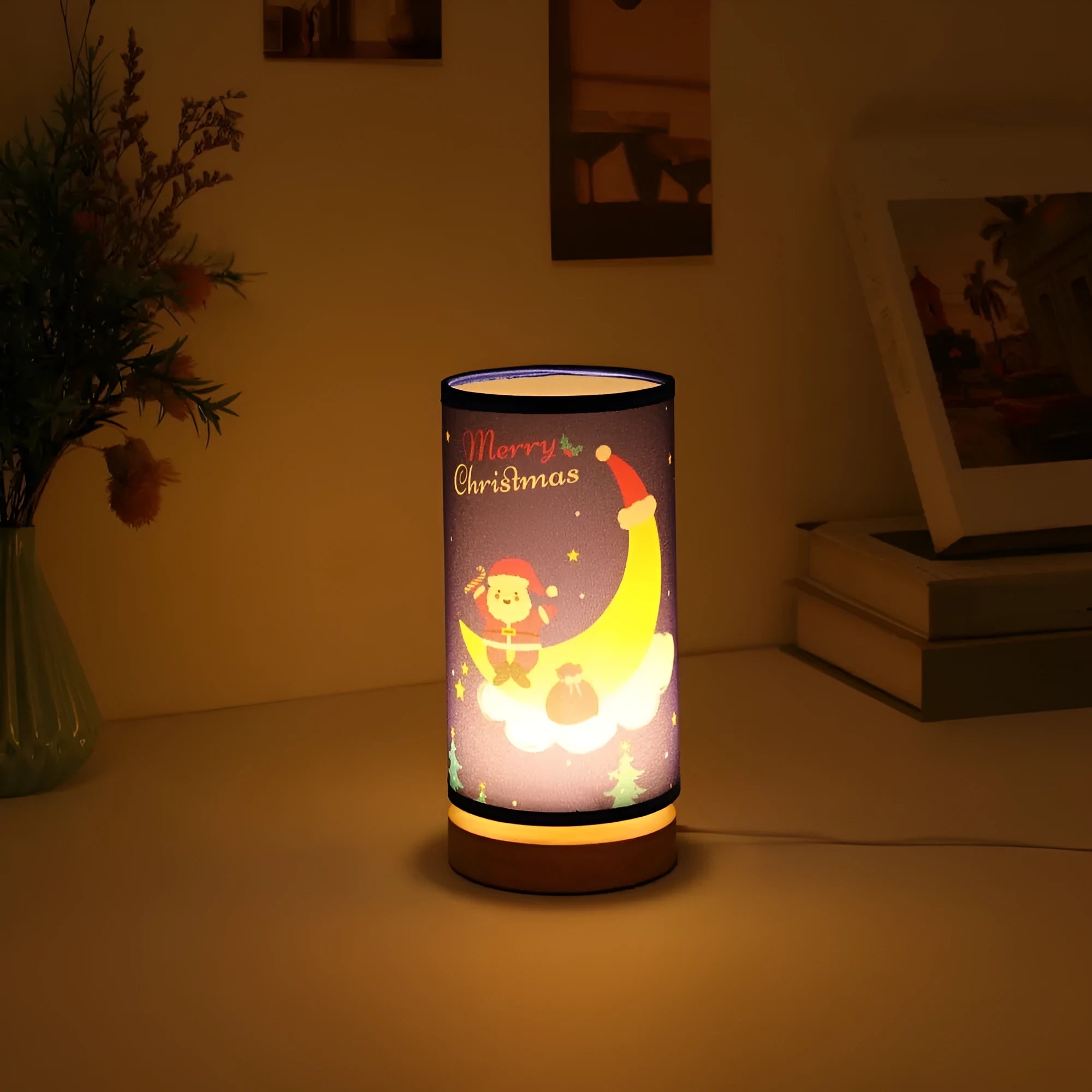 Moon Santa Claus themed LED night light with a bamboo base and a USB plug cable.