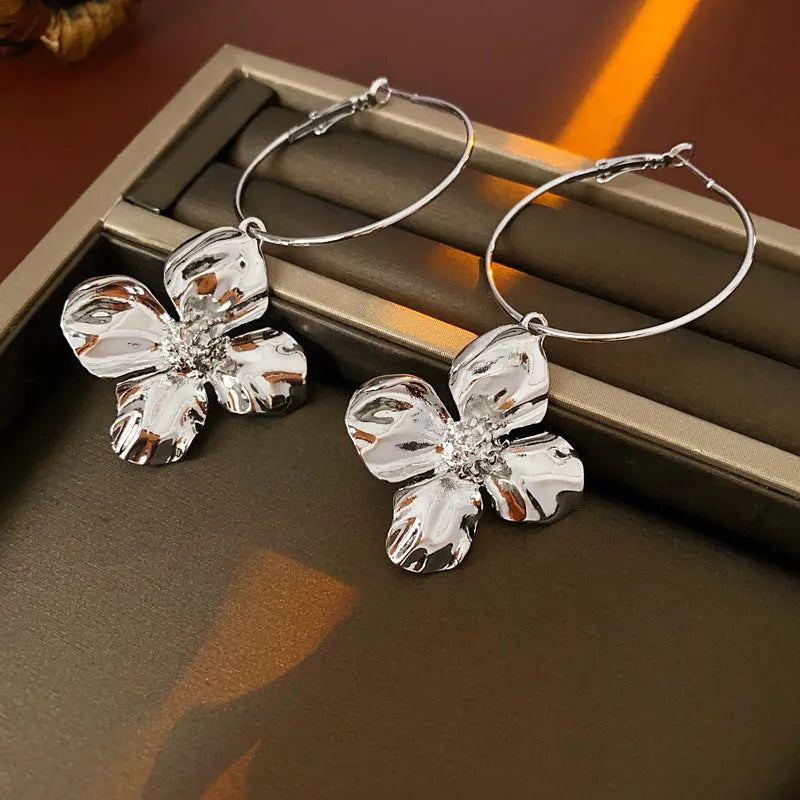 Silver needle flower geometric earrings in gold and silver colour options with vintage styling