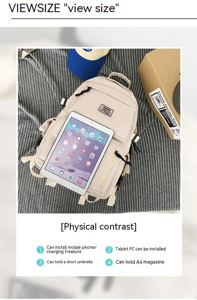 Soft nylon student backpack in black or white with computer compartment and three-dimensional pockets