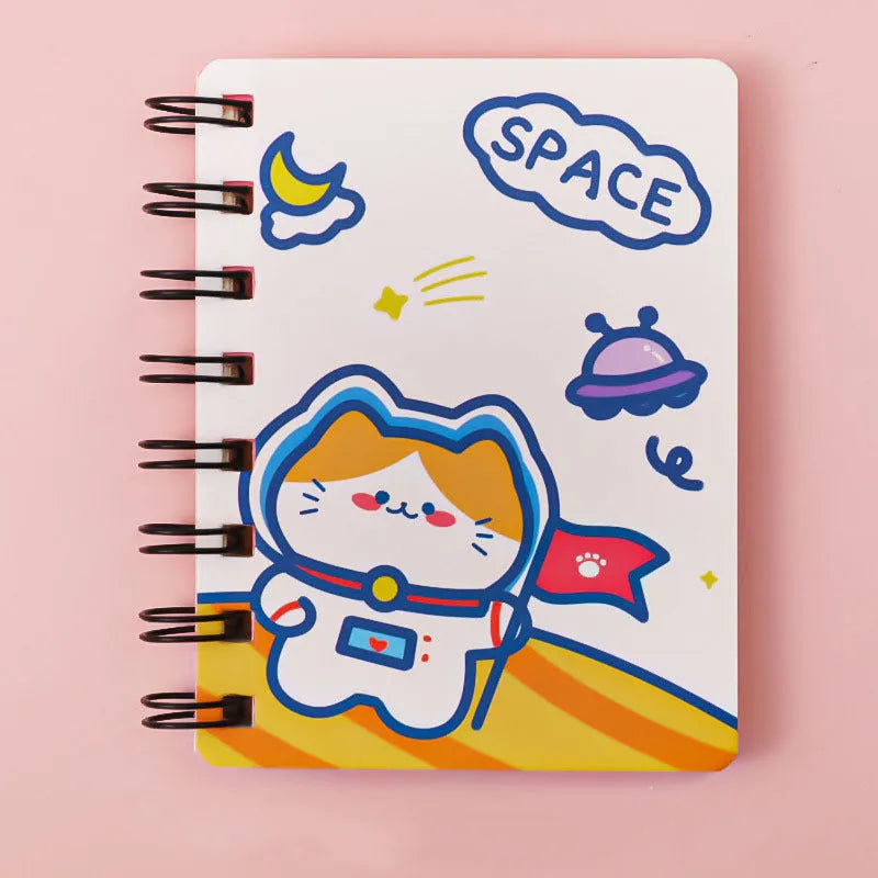 Astronaut-themed pocket notebook with flip closure showing 10.5 × 8 cm dimensions