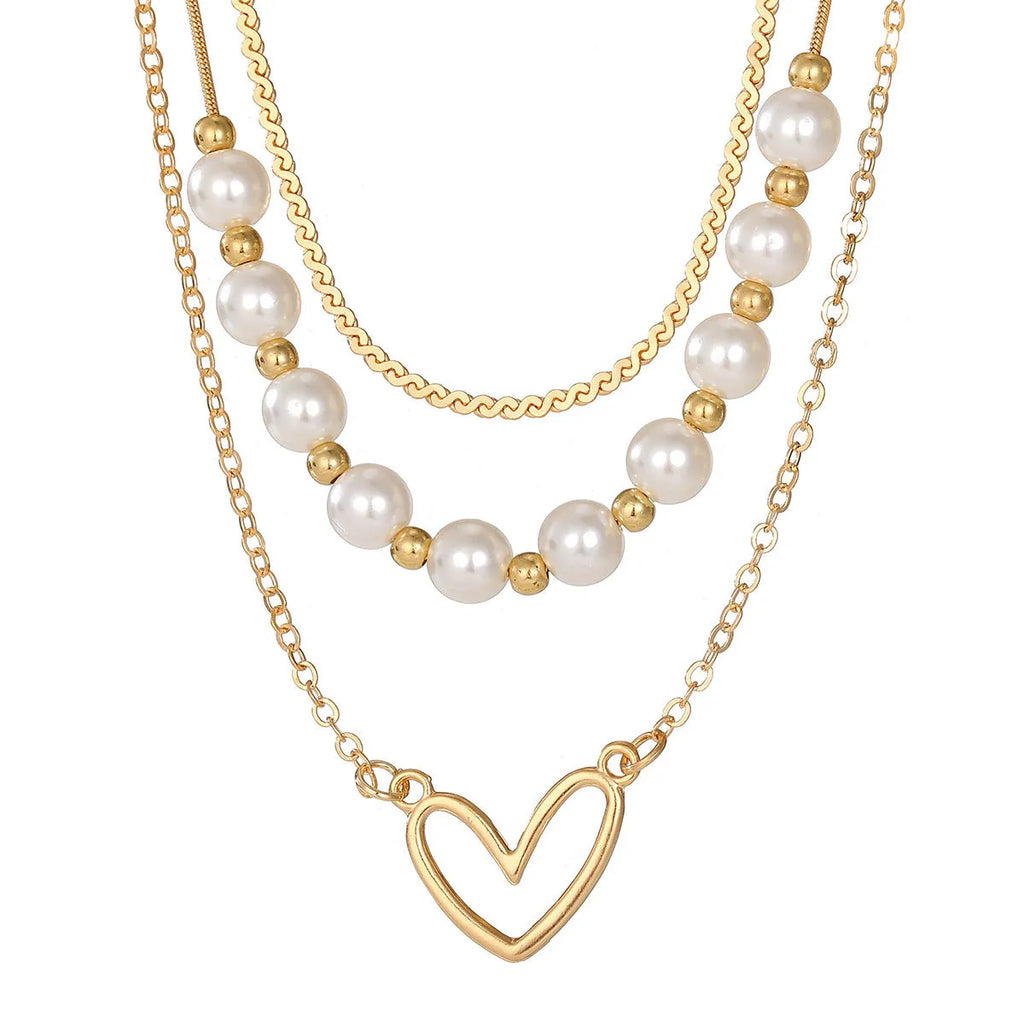 Vintage gold necklace with heart pendant on pearl chain, adjustable 41-50cm length