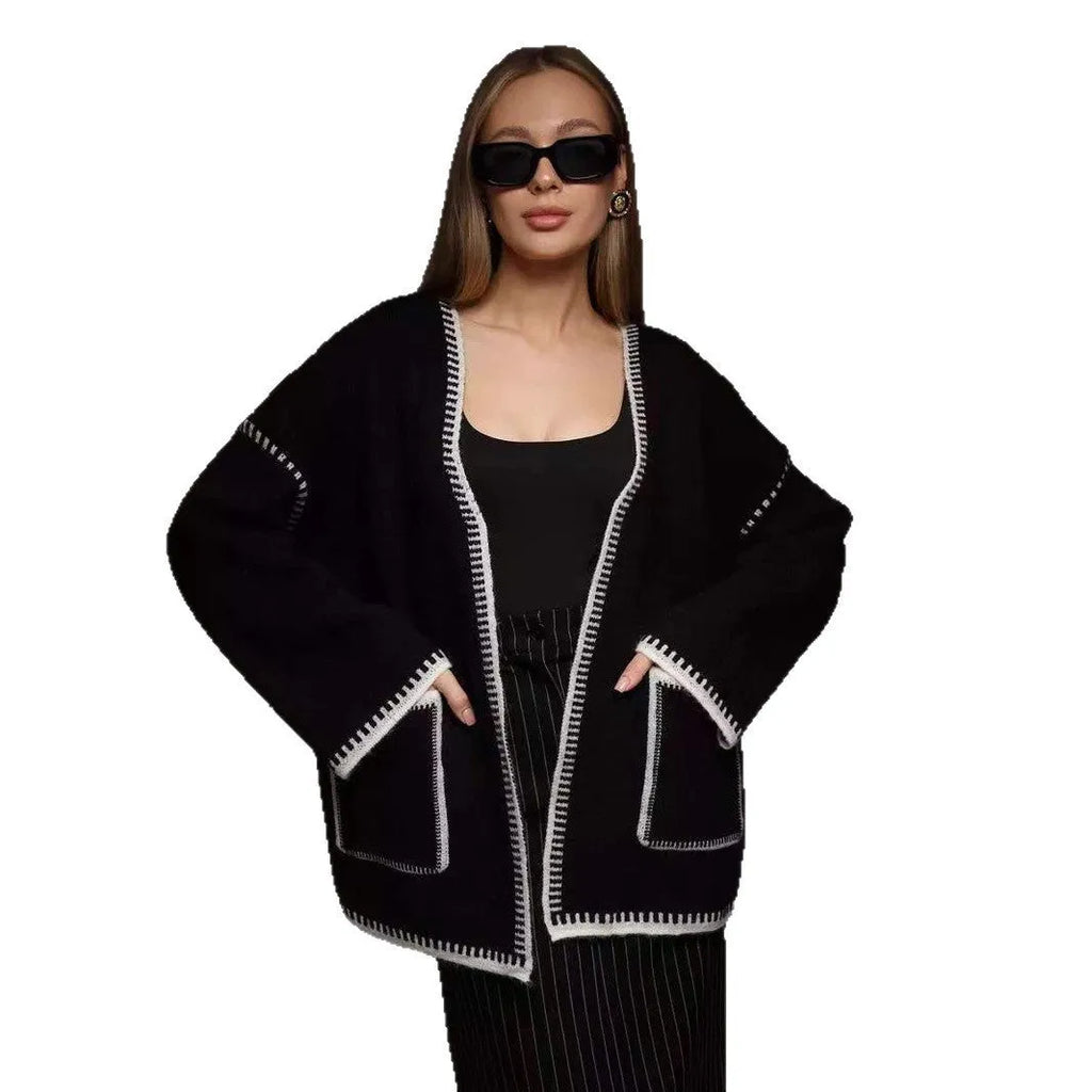 Loose mid-length knitted cardigan with lace-up front closure in cotton imitation cashmere fabric