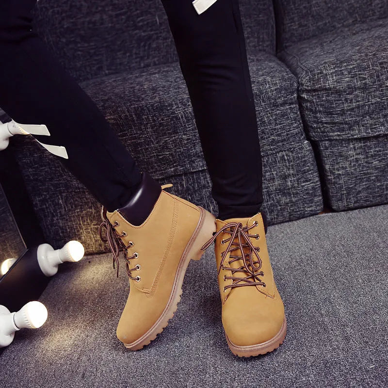 Pink men's high-top Martin boots with velvet lining, round toe, and front lace-up closure.