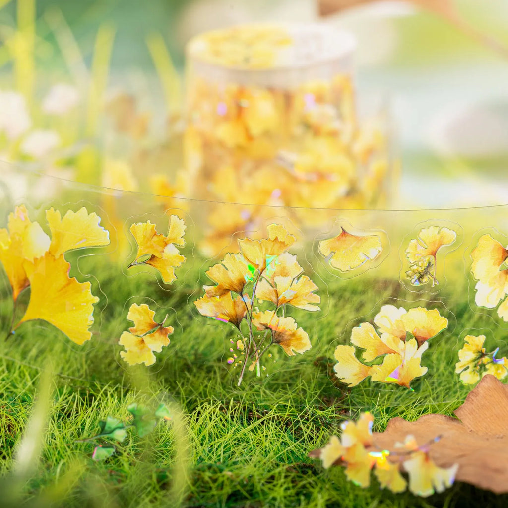 PET decorative sticker roll showing six natural leaf colour variations including ginkgo and maple designs
