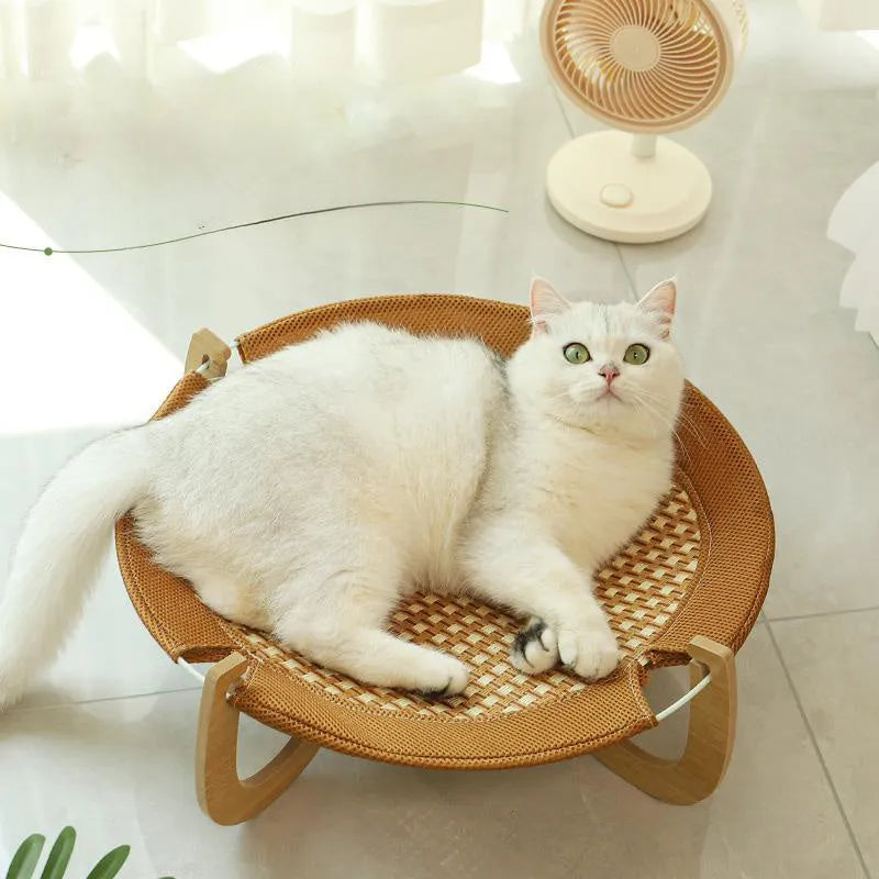 Brown rattan woven elevated pet bed measuring 46cm square with 17.5cm height