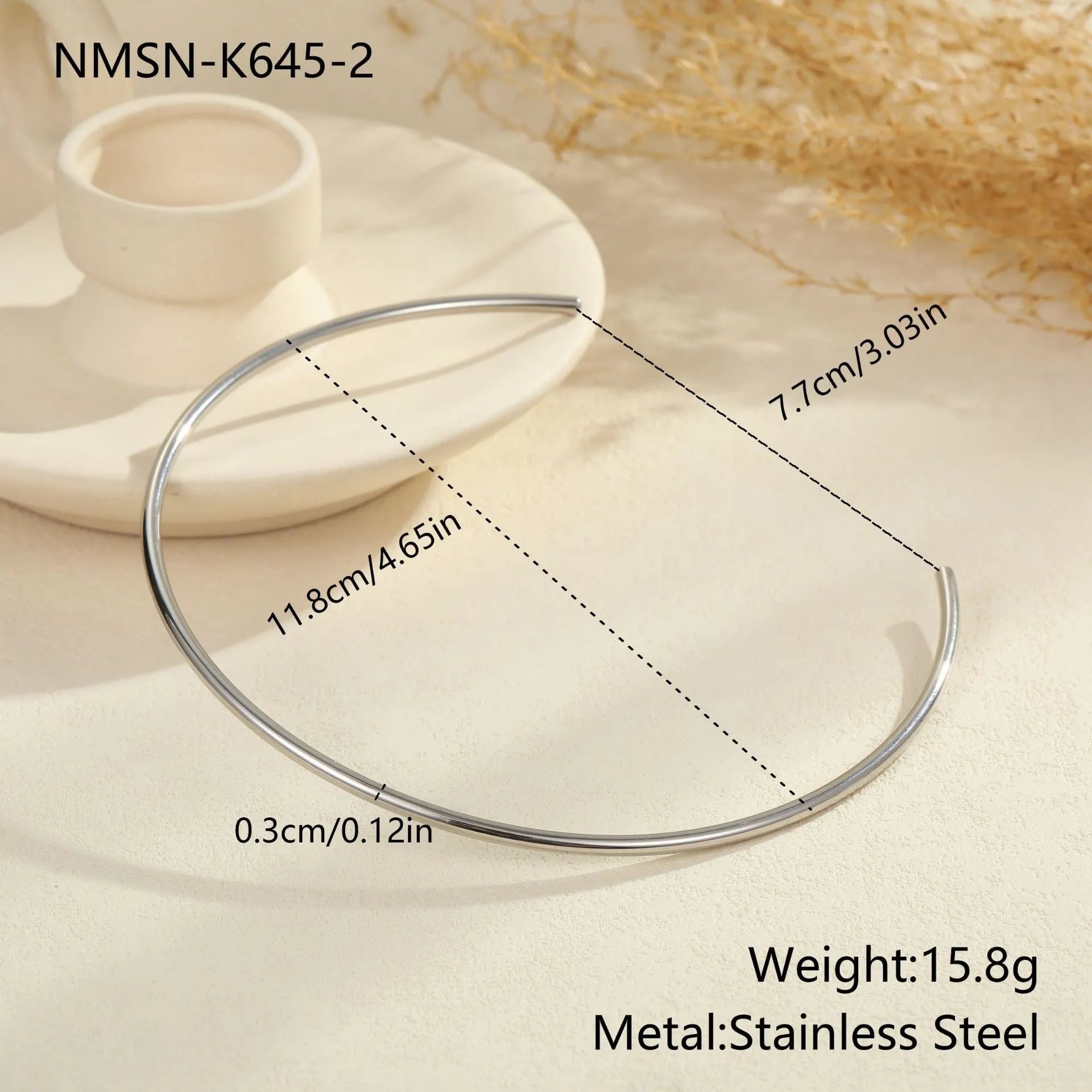 Stainless steel geometric collar necklace with adjustable length and gold electroplated finish