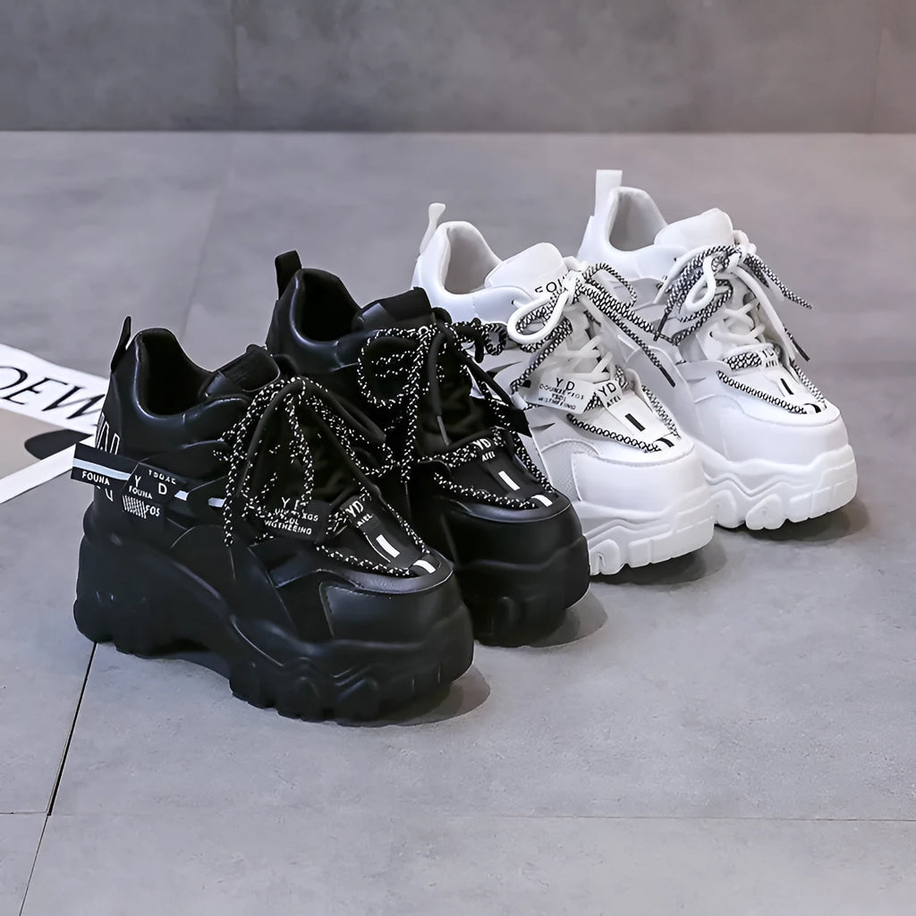 White women's platform tennis shoes with mesh upper and cross strap design