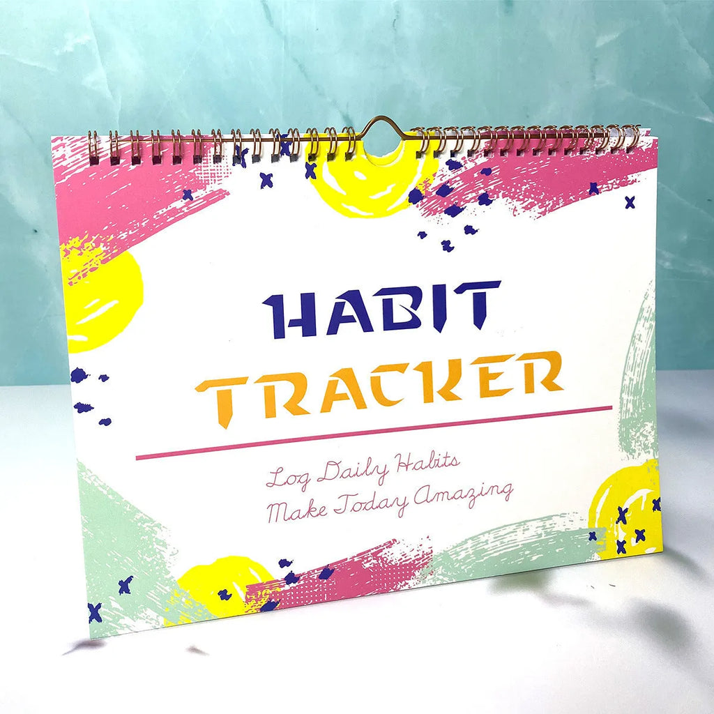 English habit tracking book with 12 pages measuring 21cm by 28cm