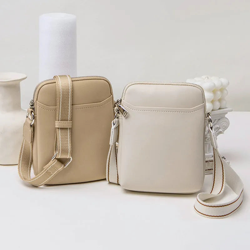Solid colour women's crossbody phone bag in black, beige, khaki, or green.