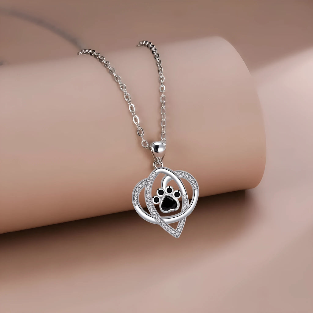 Copper pendant necklace with dog and cat paw footprints design on cross chain