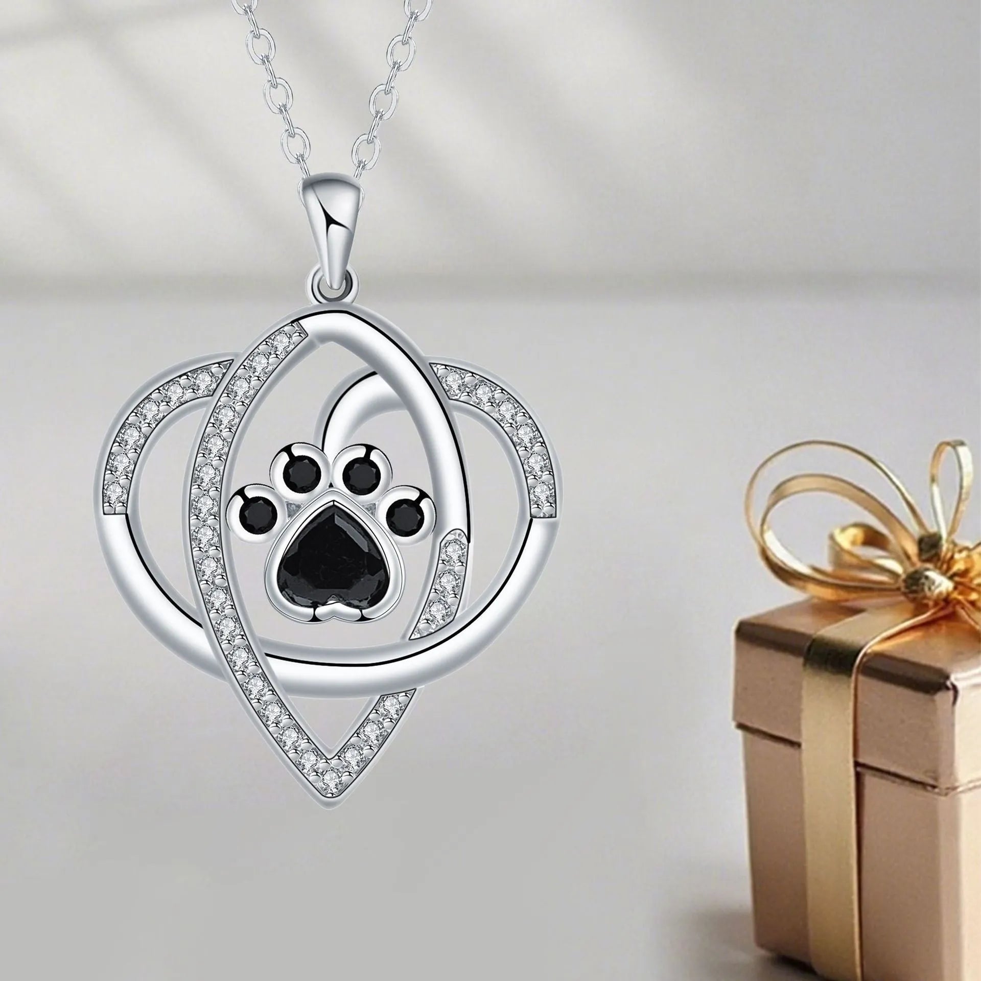 Copper pendant necklace with dog and cat paw footprints design on cross chain