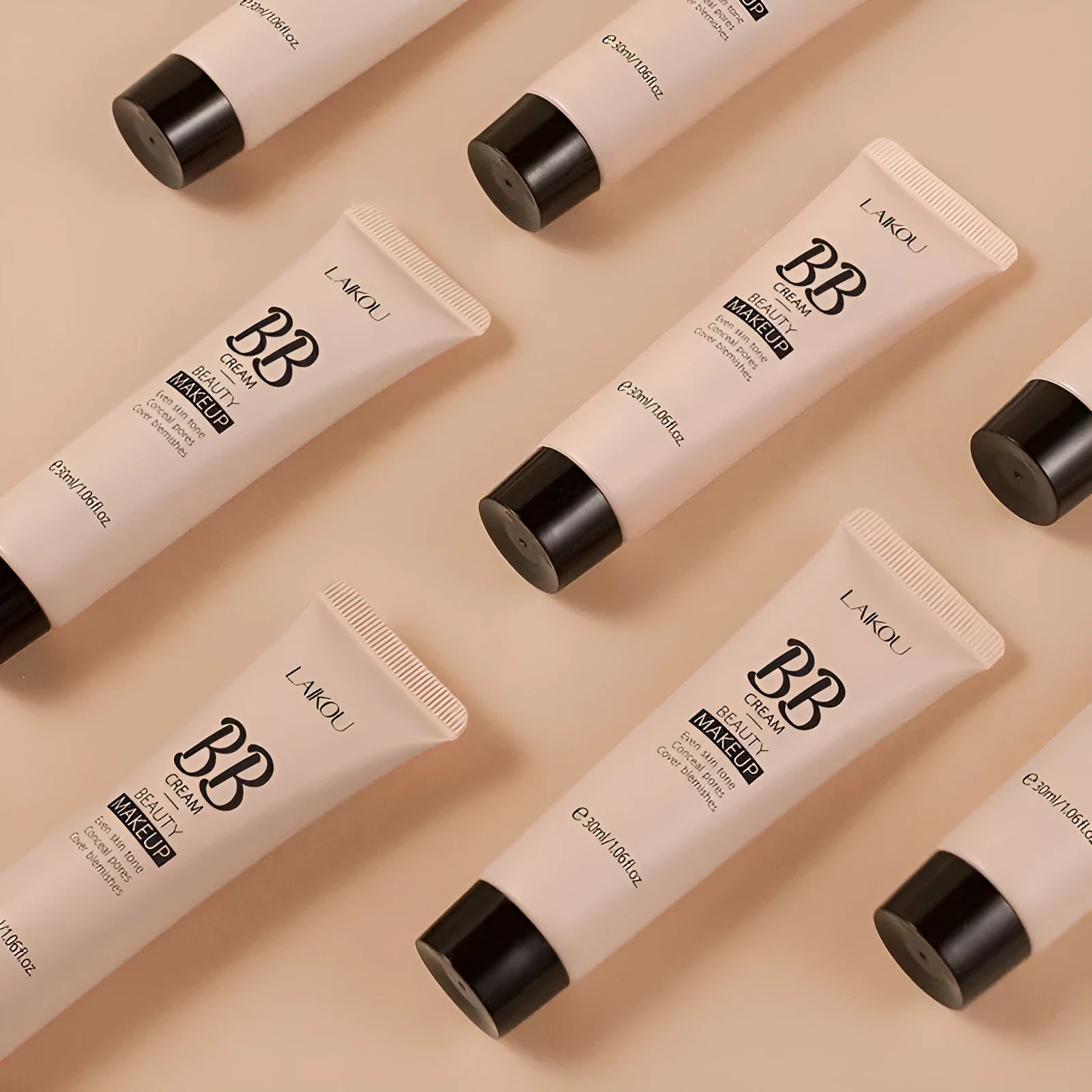 30ml tube of BB cream showing the nine available colour shades from ivory white to brown.